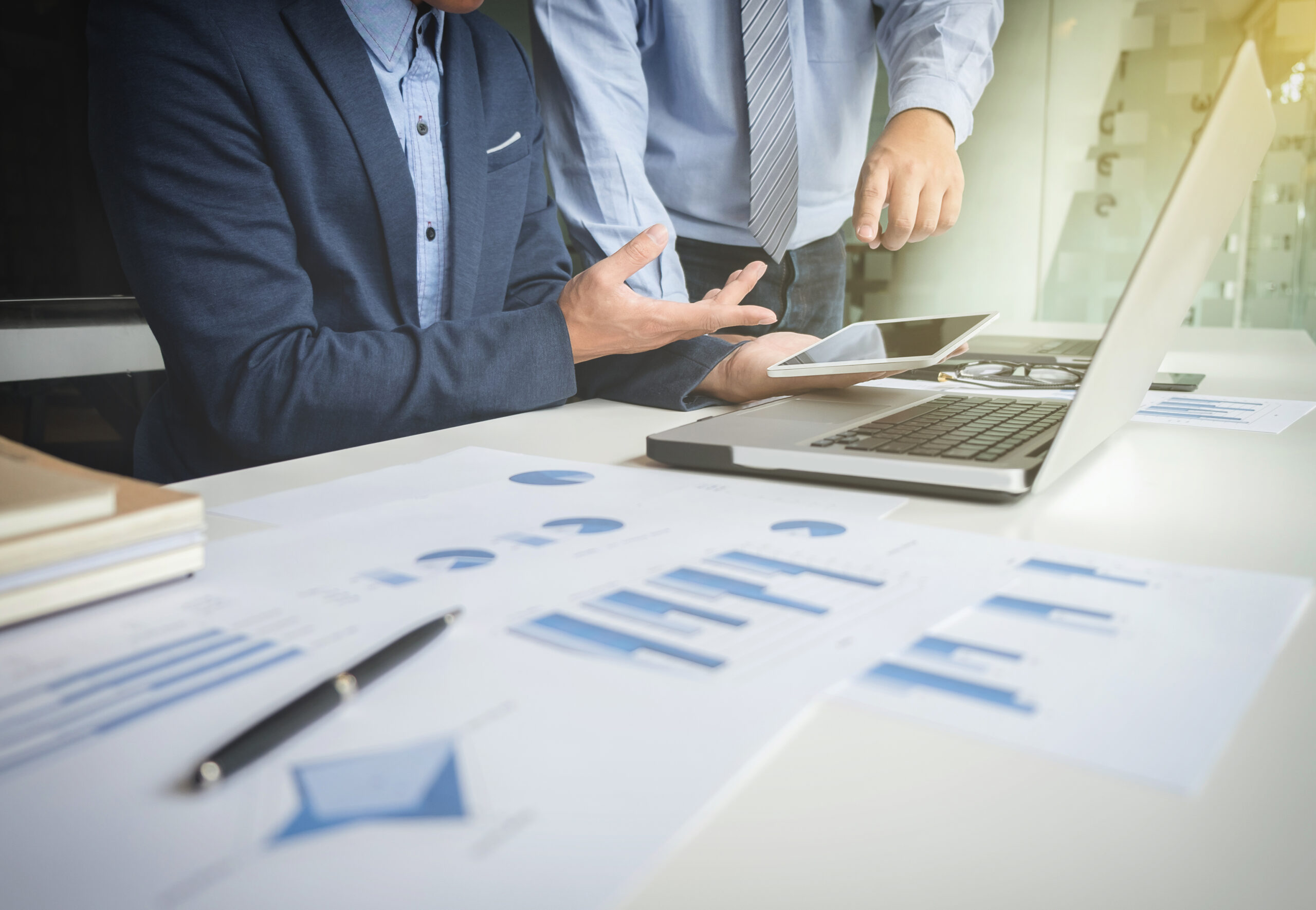 Teamwork process, Businessmen hands pointing at tablet, laptop a